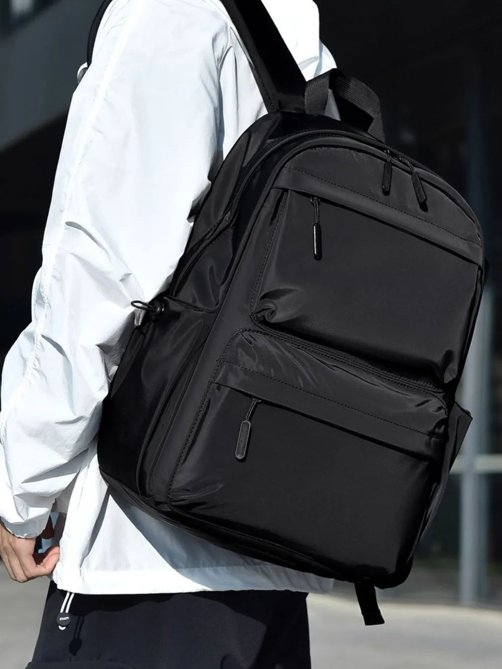 Multi-pocketed backpack with adjustable strap for suitcase – Evonouk